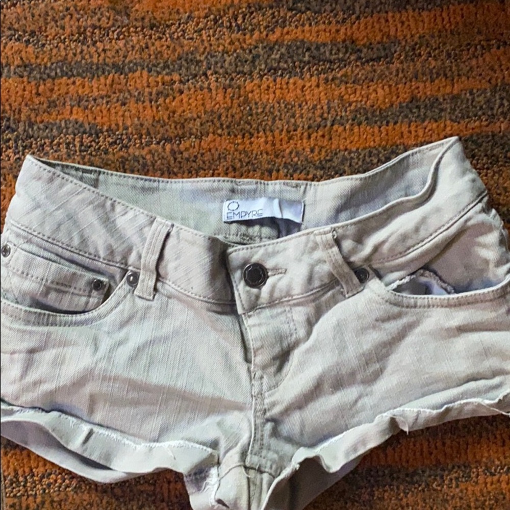 Empyre cream colored short shorts